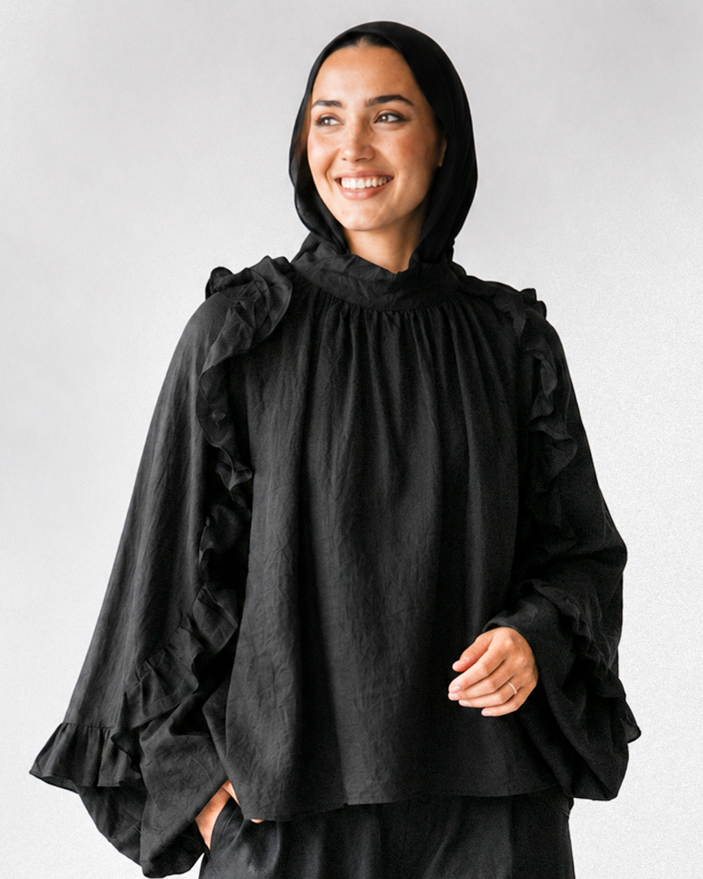 Miral linen ruffle blouse black